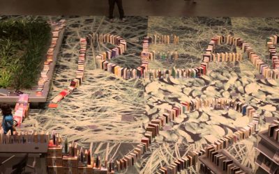 Record de cadena de dominó con libros